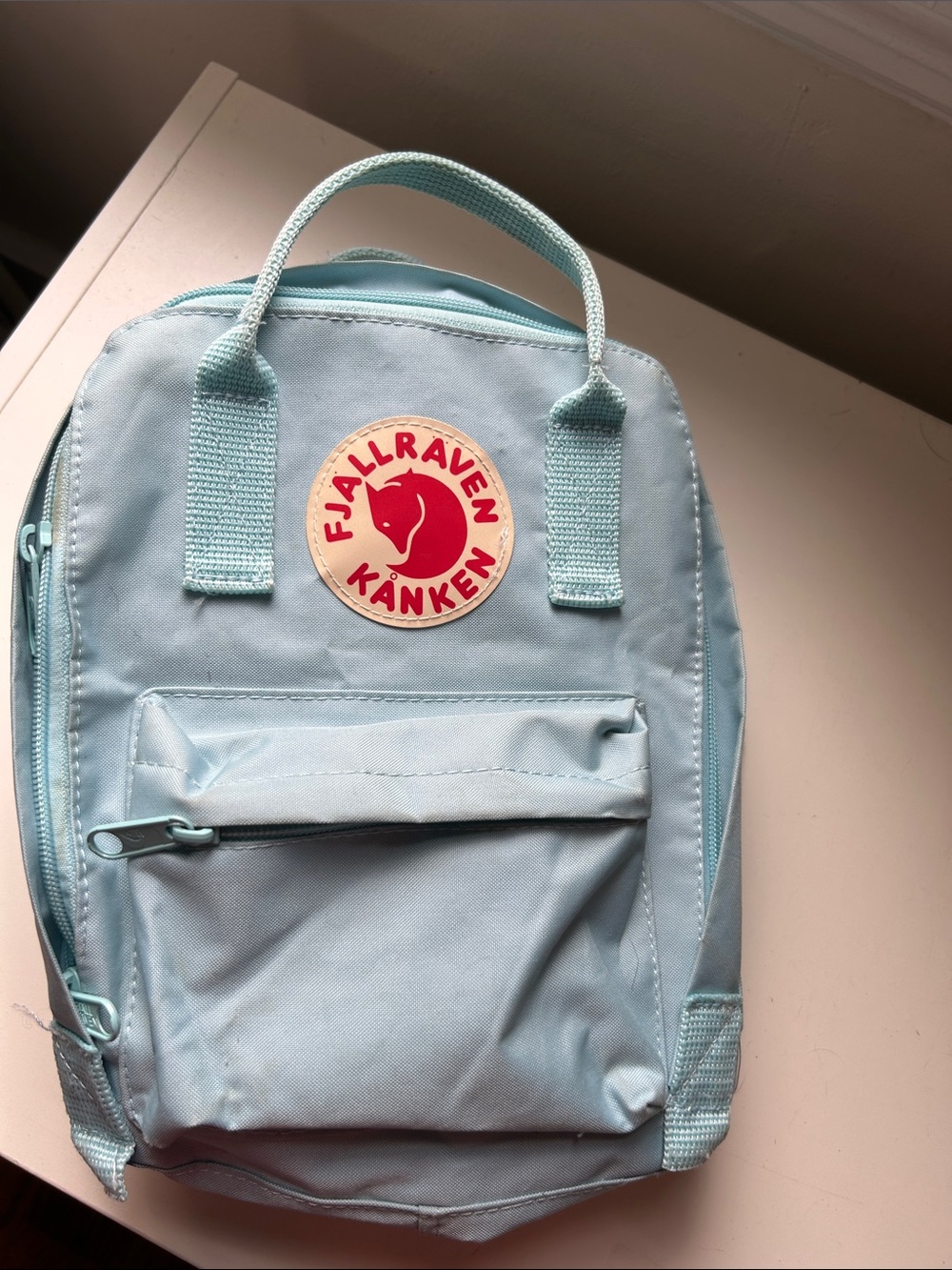 Fjallraven Kånken Mini Backpack in Light Blue with Red Logo